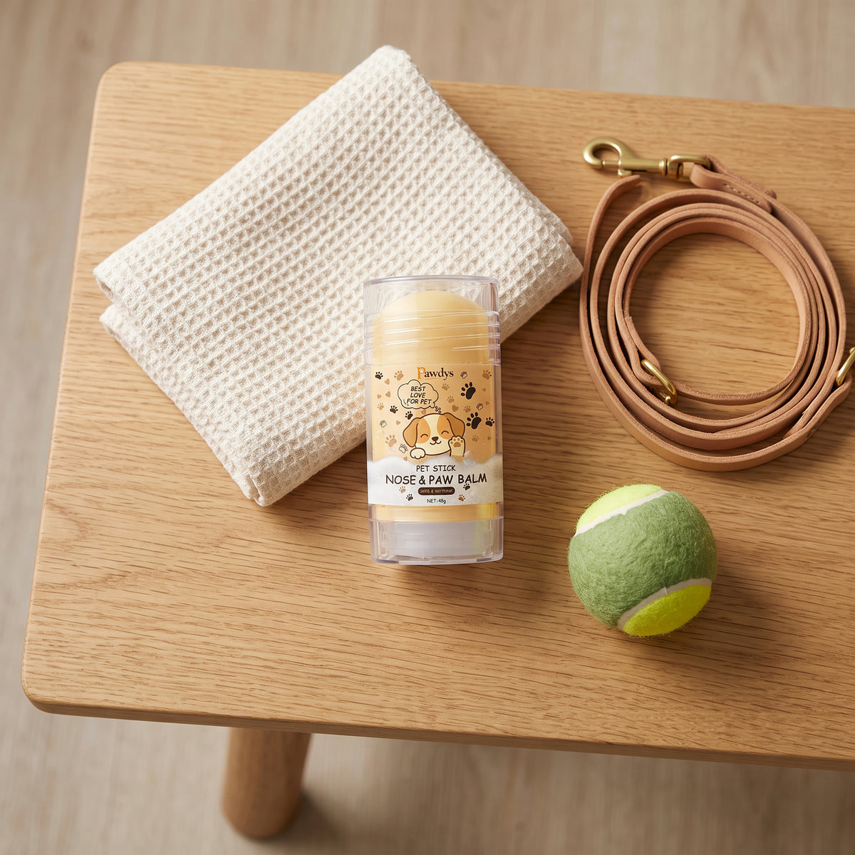 Paw balm stick with lead, towel and ball