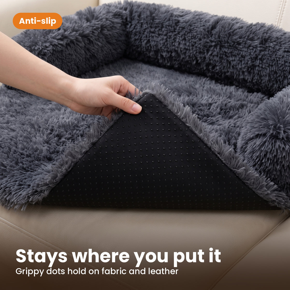 Anti-slip dotted base of the Pawdys sofa bed on a leather sofa
